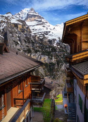 View of the Jungfrau mountain between the houses of the village of Mürren in the canton of Bern, Switzerland