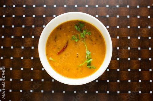 Daal Tarka served in a dish isolated on table background top view of bangladesh food