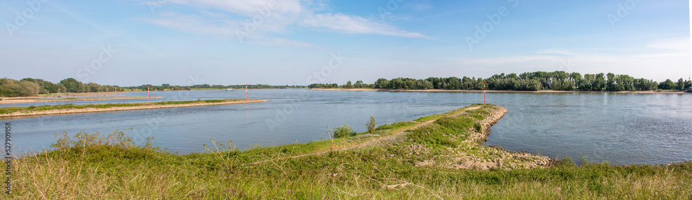 Landscape and river Rhein at the grinder tower Rees North Rhine-Westphalia Germany Landscape and river Rhein at the grinder tower Rees North Rhine-Westphalia Germany