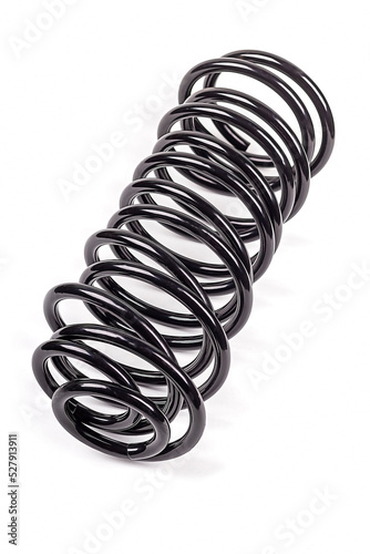 black metal spring for car. suspension elements. white background.