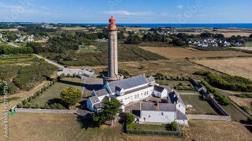 Aerial view of the Goulphar lighthouse on the island of Belle-île-en-mer in Morbihan, France - The tallest lighthouse on the biggest island of Brittany is adorned with a red metallic dome