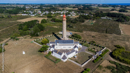 Aerial view of the Goulphar lighthouse on the island of Belle-île-en-mer in Morbihan, France - The tallest lighthouse on the biggest island of Brittany is adorned with a red metallic dome