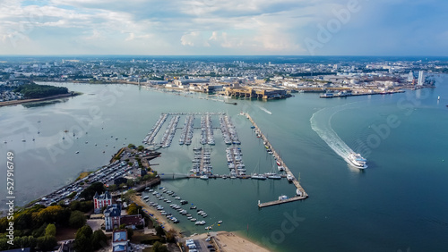 German WWII submarine base of Lorient in Brittany, France - Modern Kernevel marina facing the nazi U-boat factory and bunker of Keroman (K3) on the coast of the Atlantic Ocean