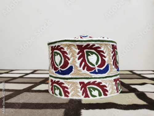
The traditional Omani hat (kumma) in white background photo
