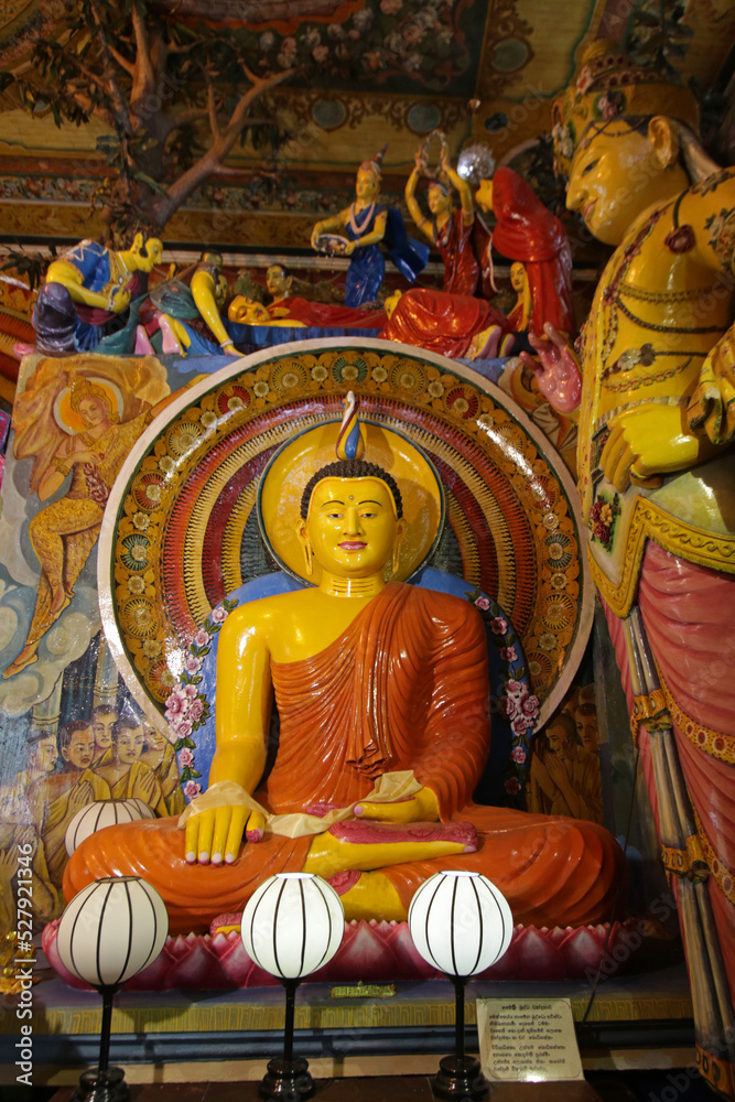 Buddha statue in Gangaramaya Temple in Colombo, Sri Lanka