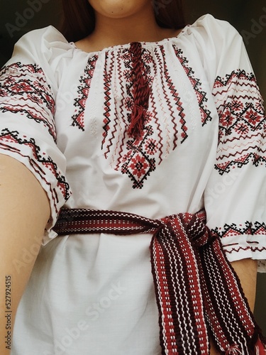 A girl in a Ukrainian embroidered shirt. Traditional clothes