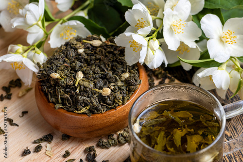 A real green hour with jasmine on the table