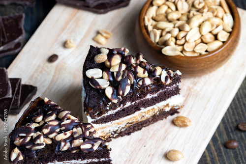 chocolate cake with nut filling and peanuts