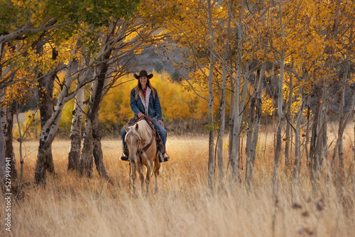 Wyoming Cowgirl at Work in the Fall photo