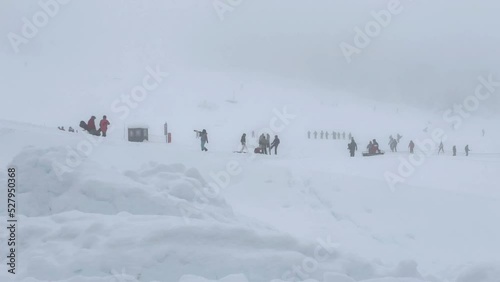 People Practicing Snow Sports at Chapelco Ski Resort in Neuquen Province, Argentina. 4K Resolution. photo