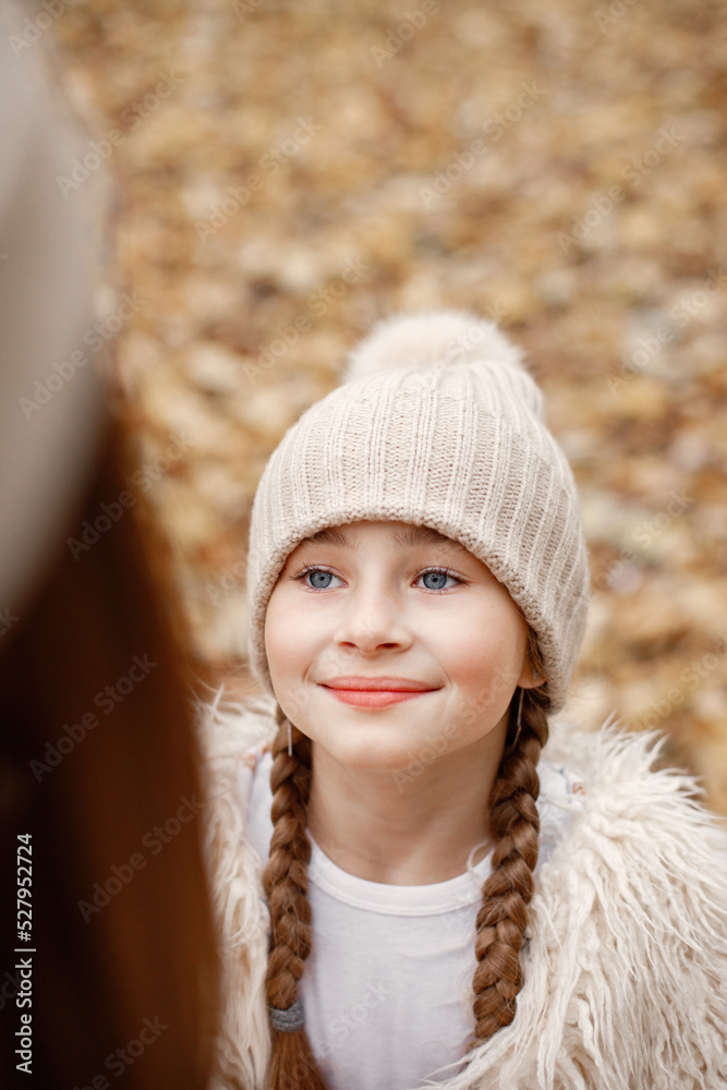 Close up portrait of a girl who playing and having fun in autumn forest Close up portrait of a girl who playing and having fun in autumn forest