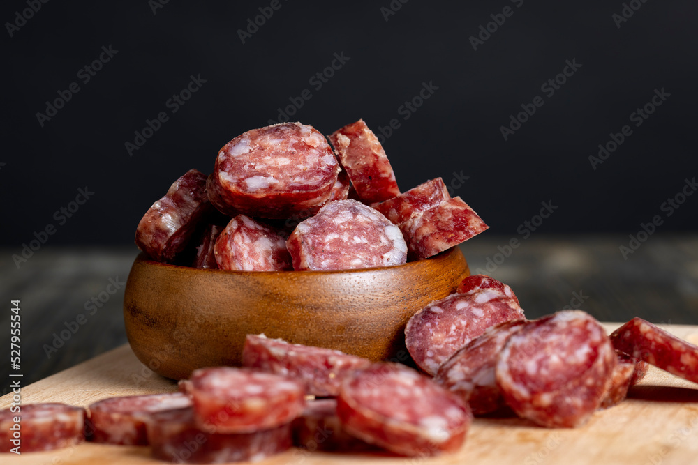 Cut the finished sausage into pieces on a cutting board