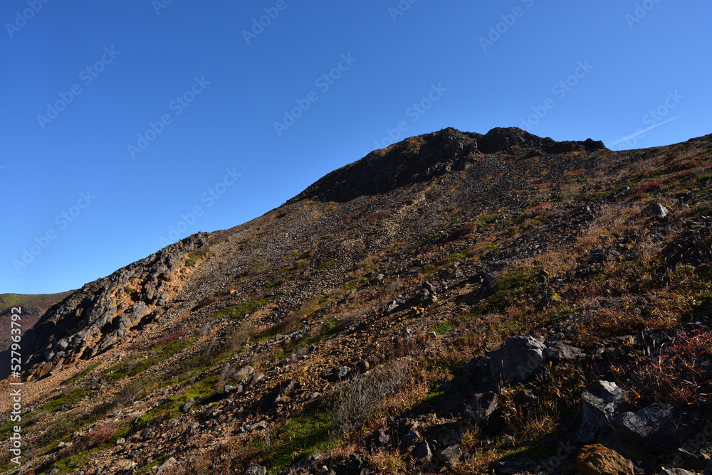 Climbing mountain in autumn, Nasu, Tochigi, Japan Climbing mountain in autumn, Nasu, Tochigi, Japan
