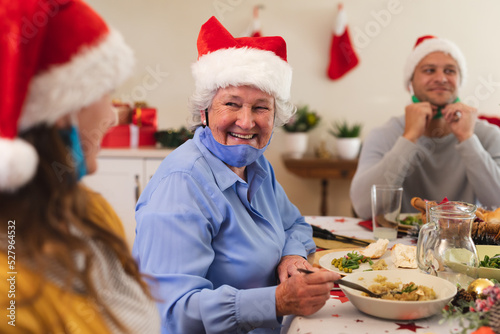 Caucasian woman sitting at table for dinner