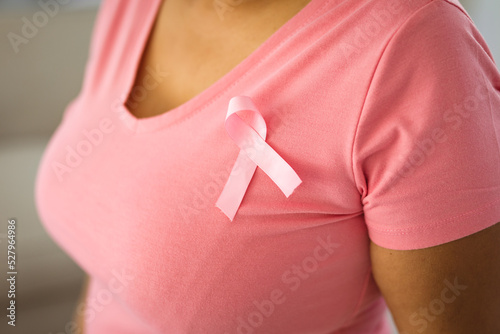 Wallpaper Mural Midsection of woman with breast cancer awareness ribbon on pink t-shirt Torontodigital.ca