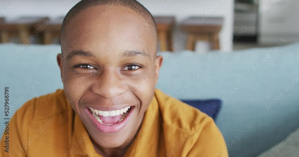 Video of happy african american boy posing at camera at home Video of happy african american boy posing at camera at home
