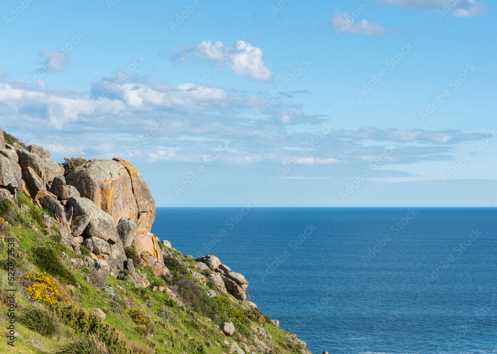 Rocky cliff face at Petrel cove, looking out to the vast Southern Ocean in South Australia