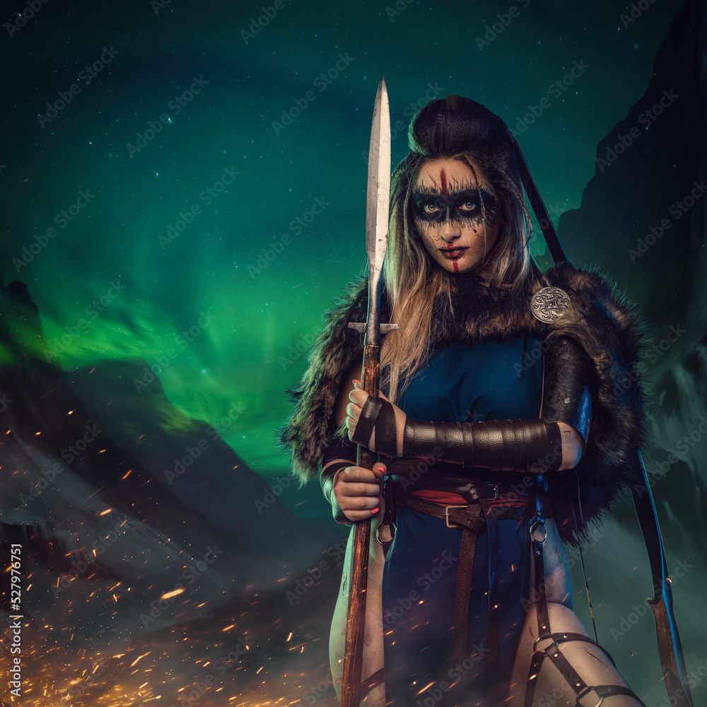 Artwork of antique nordic warrior woman with strup back longbow holding spear.