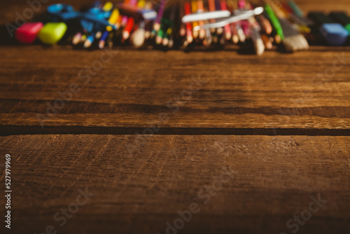 Color pencils on wooden table