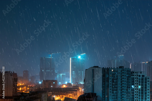 aerial view night city rain. High Angle Cityscape During A night rain Storm