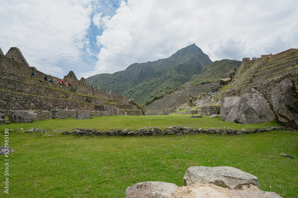 Machu picchu, pre columbian inca site situated on a mountain ridge above the urubamba valley in Peru.