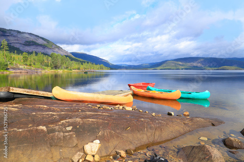 View at the lake Skredvatn and canoes, Fyresdal - South Norway photo