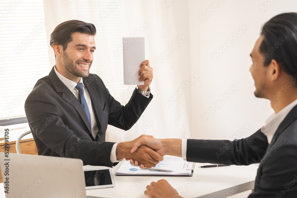 Handshake, caucasian male giving financial reward in an envelope, business letter extra salary to company employee, asian manager man worker office hand received premium bonus,getting cheque from boss Handshake, caucasian male giving financial reward in an envelope, business letter extra salary to company employee, asian manager man worker office hand received premium bonus,getting cheque from boss