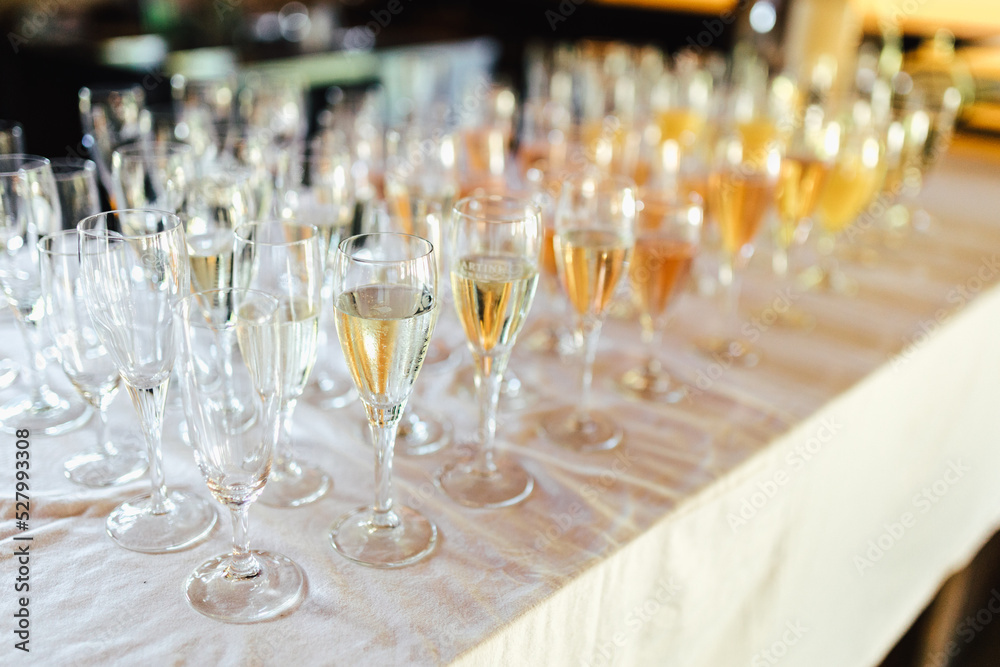 Alcoholic beverages at a wedding. Glasses and drinks at an event.