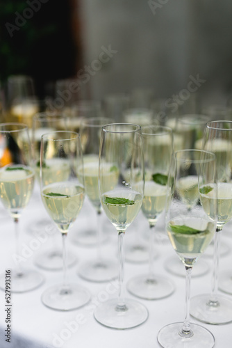 Alcoholic beverages at a wedding. Glasses and drinks at an event.