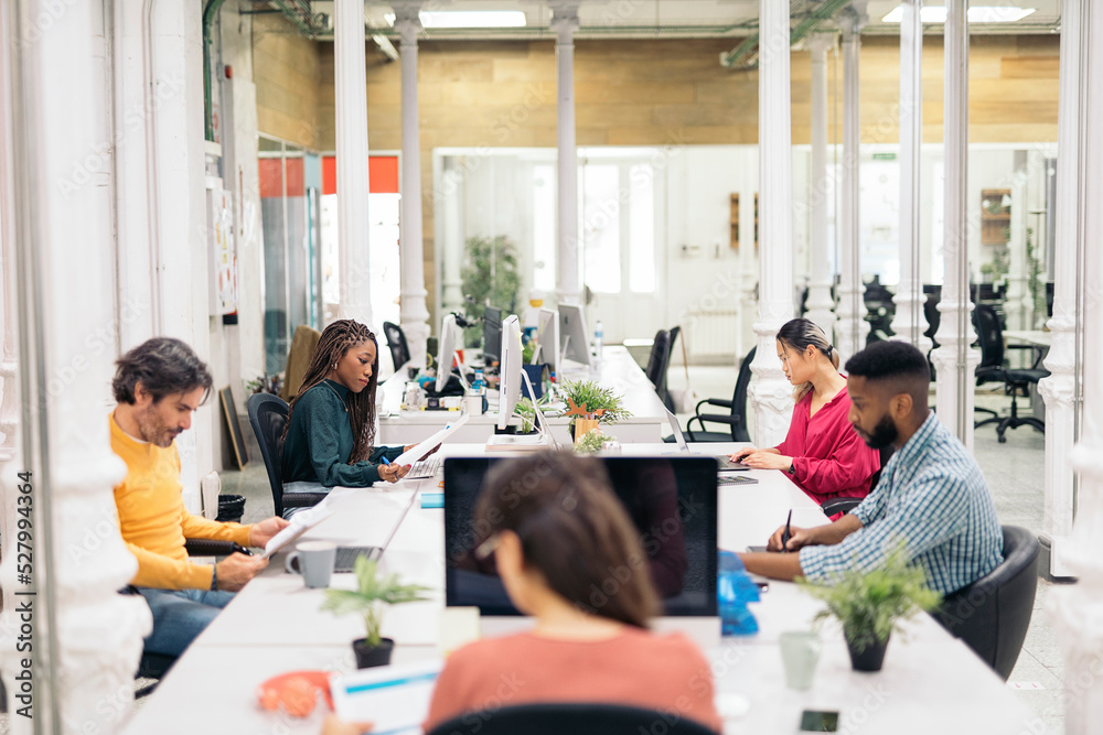 Obraz premium Office Workers in Co-Working Office