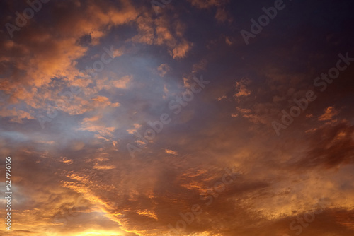 Beautiful sunset sky with clouds. Amazing summer sunset background