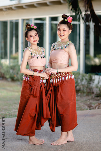 It is a dress show that was invented from thesis of students,name of the show is Phijitnakara.The dress has a flesh color tube top and a beautiful red sarong,necklace made with buprestis beetle wings.