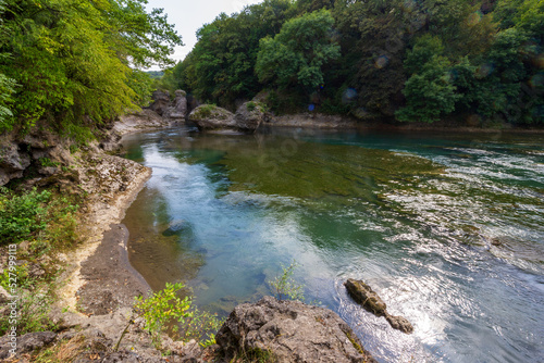 beautiful landscape with a mountain river on a summer day