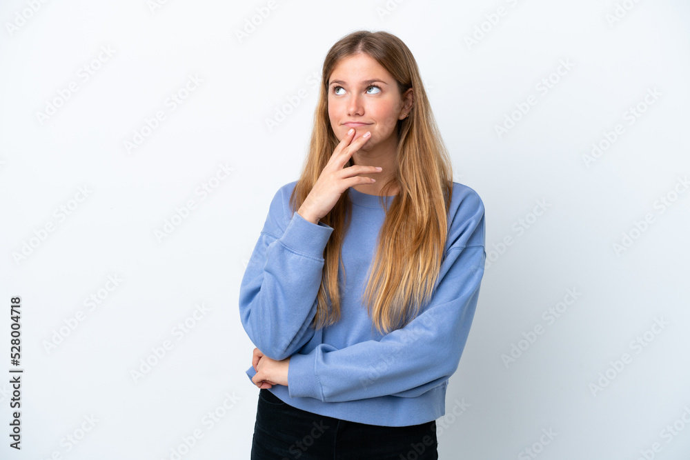 Young blonde woman isolated on white background and looking up Young blonde woman isolated on white background and looking up