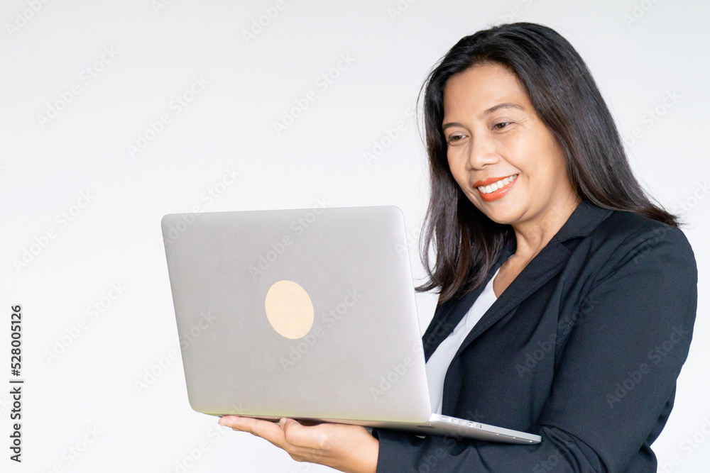 Working Business Woman in Black Suit Jacket Holding Labtop Computer Working Business Woman in Black Suit Jacket Holding Labtop Computer