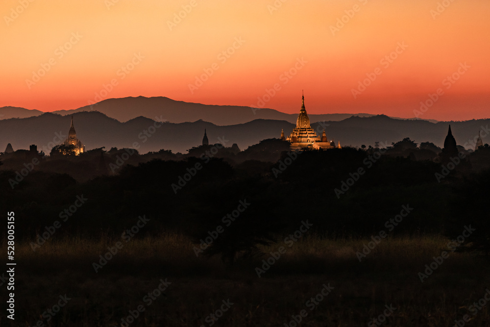 The romantic sunset behind the temples of Bagan in Myanmar