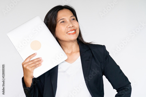 Working Business Woman in Black Suit Jacket Holding Labtop Computer
