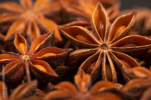 Star anise flat lay as background. Indian spices close up. Medicinal herbs and spices.