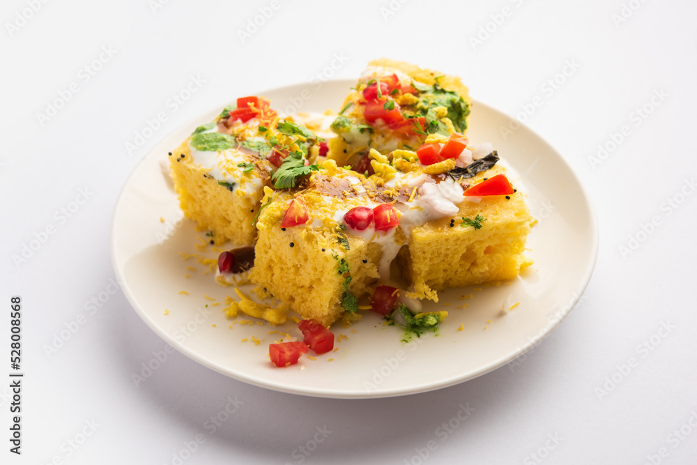 Khaman Dhokla chaat is a very simple and refreshing fusion chaat recipe made using leftover dhokla Khaman Dhokla chaat is a very simple and refreshing fusion chaat recipe made using leftover dhokla