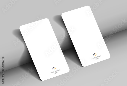 Mockup of a realistic business card with rounded corners, on a textured background with realistic shadows. Vector illustration EPS 10