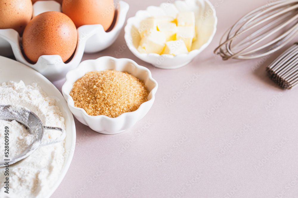 Baking or cooking background frame. Ingredients, kitchen items for baking cakes. Kitchen utensils, flour, eggs, brown sugar, butter. Text space, top view. Cookies Pie Or Cake Recipe Mockup Baking or cooking background frame. Ingredients, kitchen items for baking cakes. Kitchen utensils, flour, eggs, brown sugar, butter. Text space, top view. Cookies Pie Or Cake Recipe Mockup
