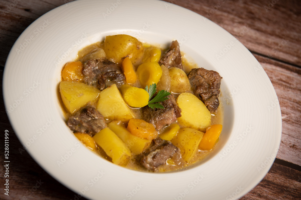 Recipe for beer and mustard beef chuck stew with potatoes, turnips and carrots, High quality photo