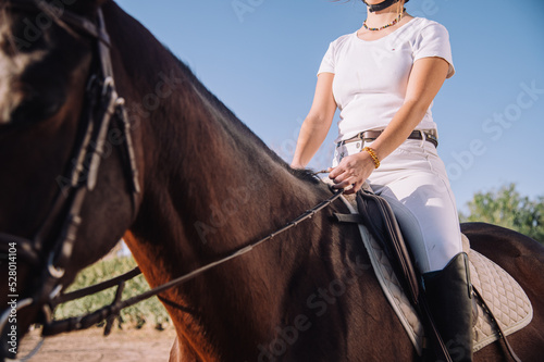 person riding horse