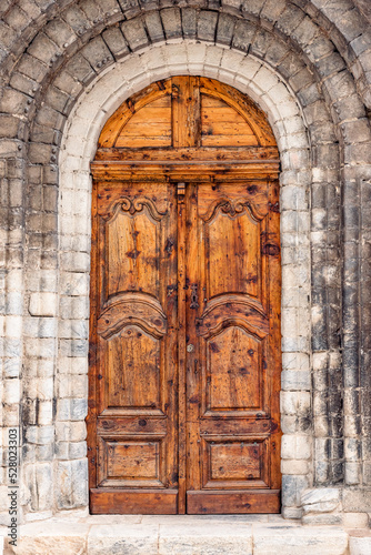 Old wooden door in church