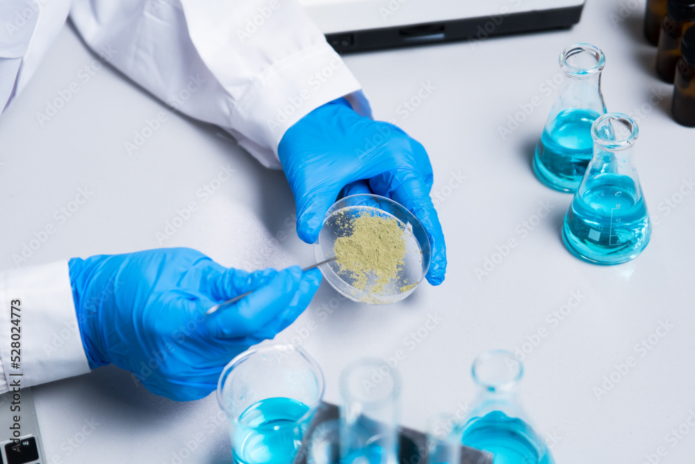 Fototapeta premium Close-up of scientists researching pathogens to make vaccines, biotechnology studies from bacterial cells in a lab, researchers culture in petri dishes.