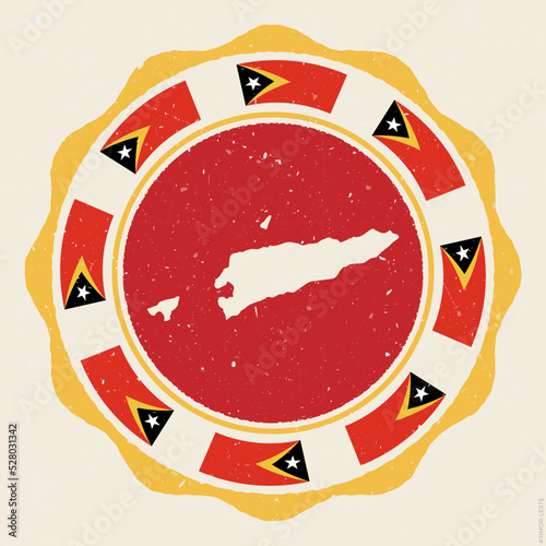 Timor-Leste vintage sign. Grunge round logo with map and flags of Timor-Leste. Radiant vector illustration.