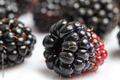 Blackberry isolated on white background. Fresh summer wild berries closeup.