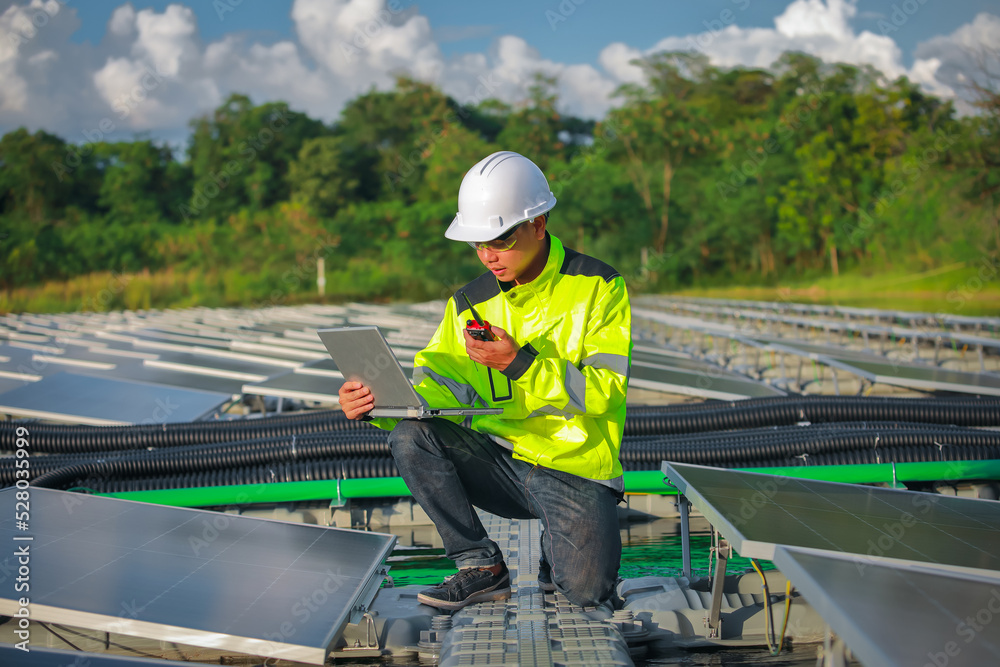 Portrait of professional man engineer working checking the panel Portrait of professional man engineer working checking the panel