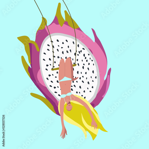 Tiny girl upside down on a swing against the background of a huge dragon fruit, pitaya, pitahiya, summer mood, summer vibes, organic, healthy food, vitamins.