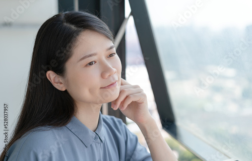 woman sitting by the window